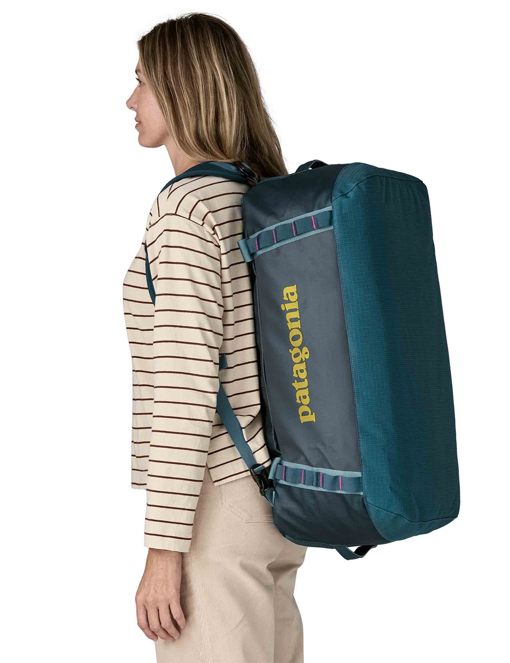 Black Hole Duffel Bag 55L - Tidal Teal w/Luminous Pink - Image 4